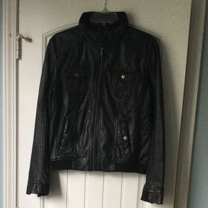 NEW Guess 100% genuine leather jacket. Good quality, fully lined. 4 pockets.